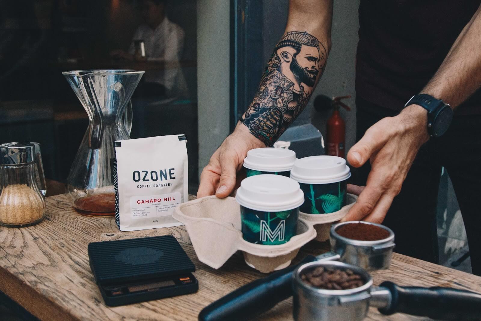 man delivering coffee postmates driver requirements