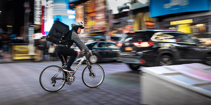 Bicyclist delivers food for gig economy job