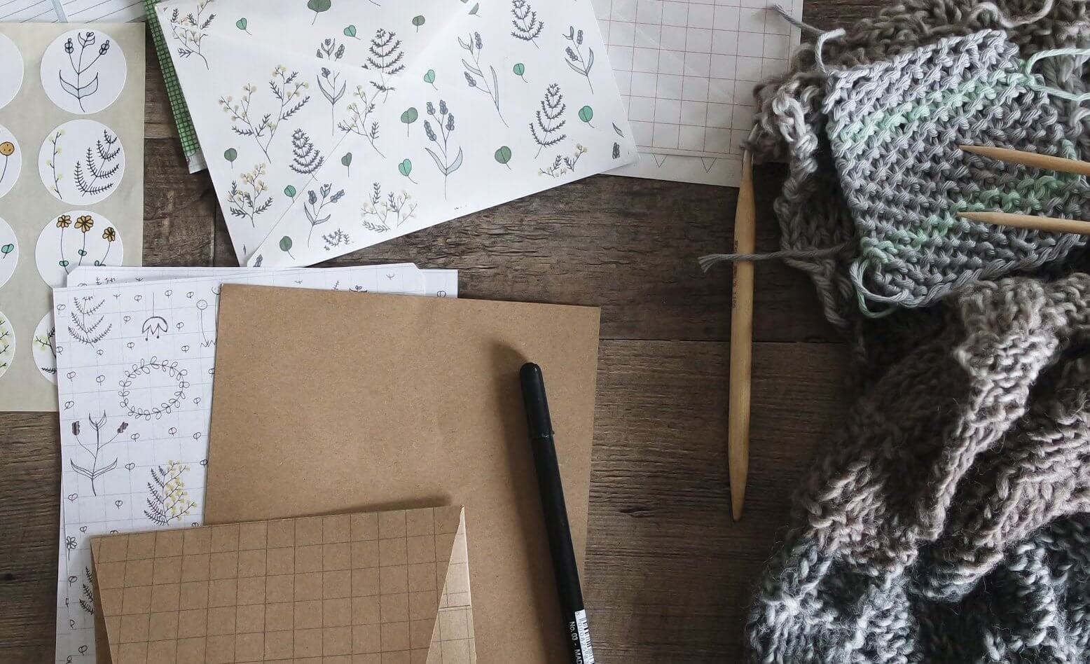 Pen, paper, and knitting needles