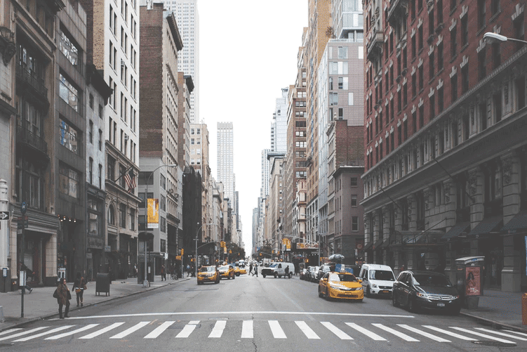 New York City street with taxis and cars