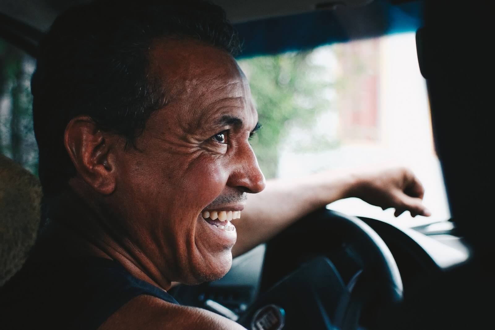Uber driver talking with passenger
