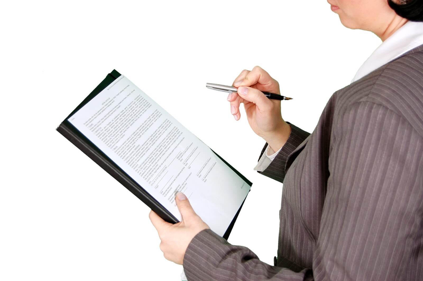 Operating agreement: A business woman reviews paperwork