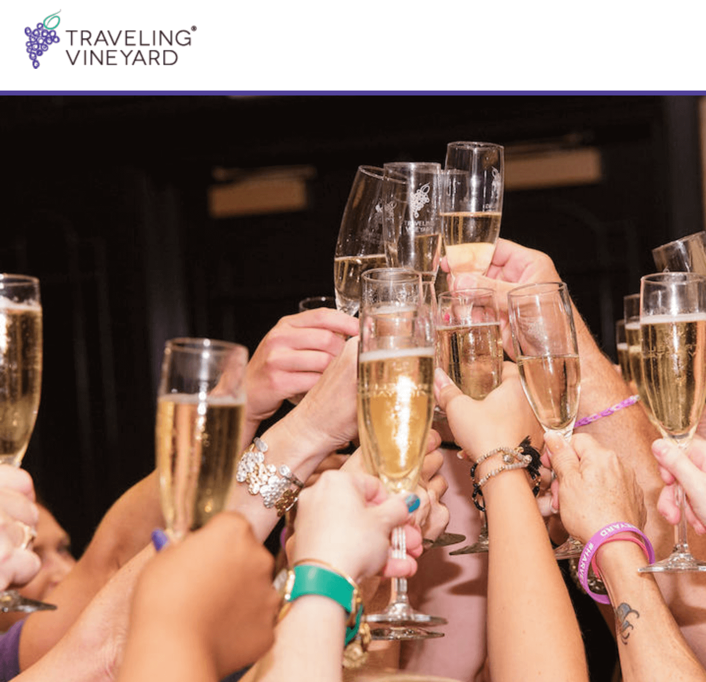 Many people doing a champagne toast