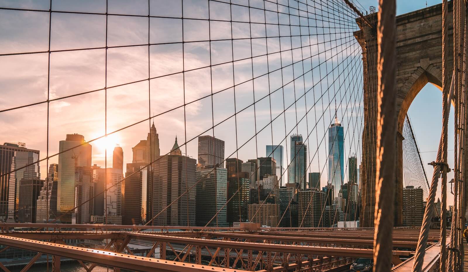 Uber cities: a view of the Manhattan skyline from the Brooklyn Bridge