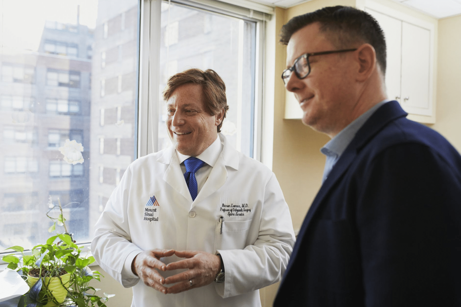 Selling plasma: A doctor gives a consultation