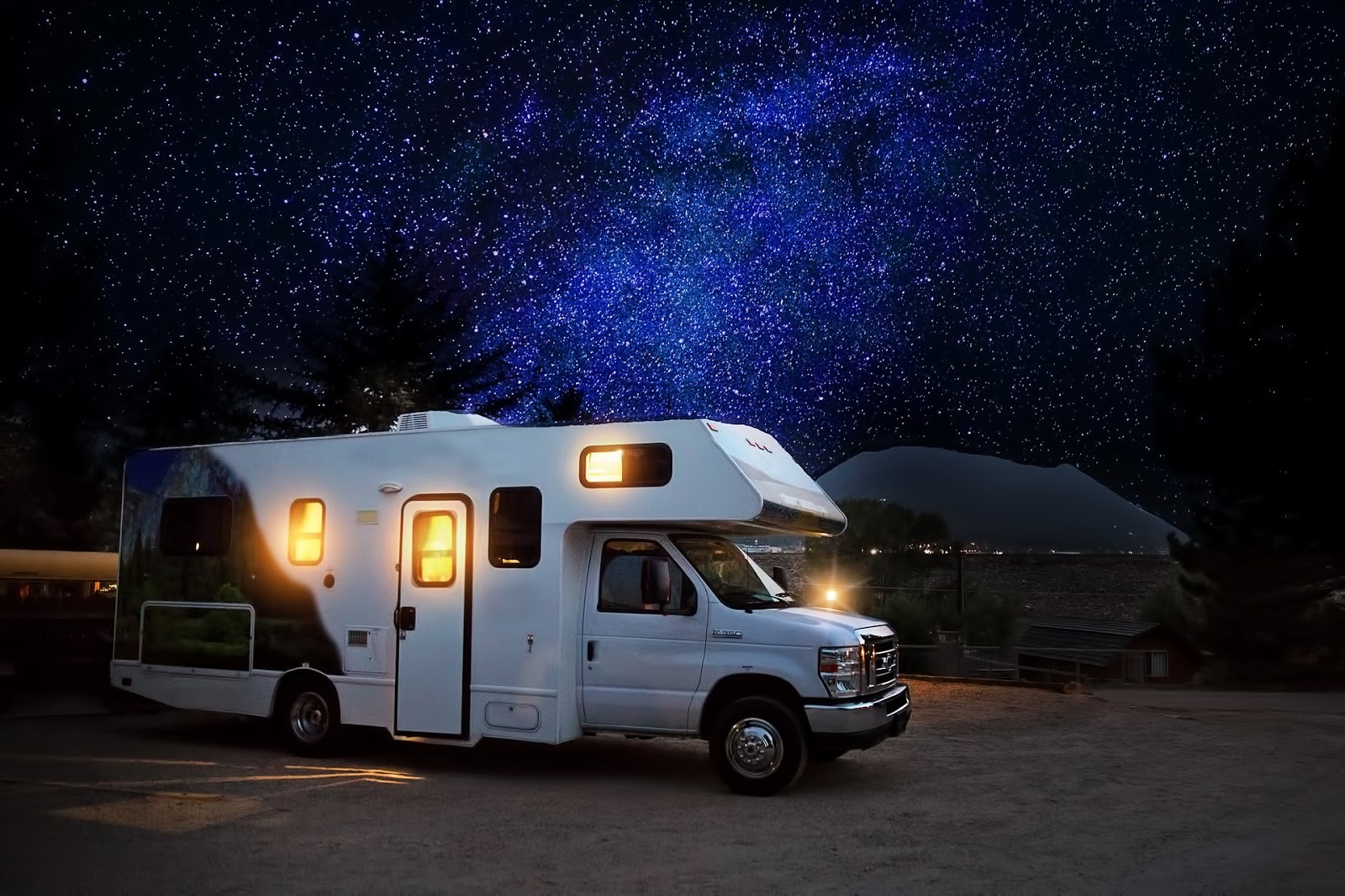 RVshare: an RV parked under a starry sky