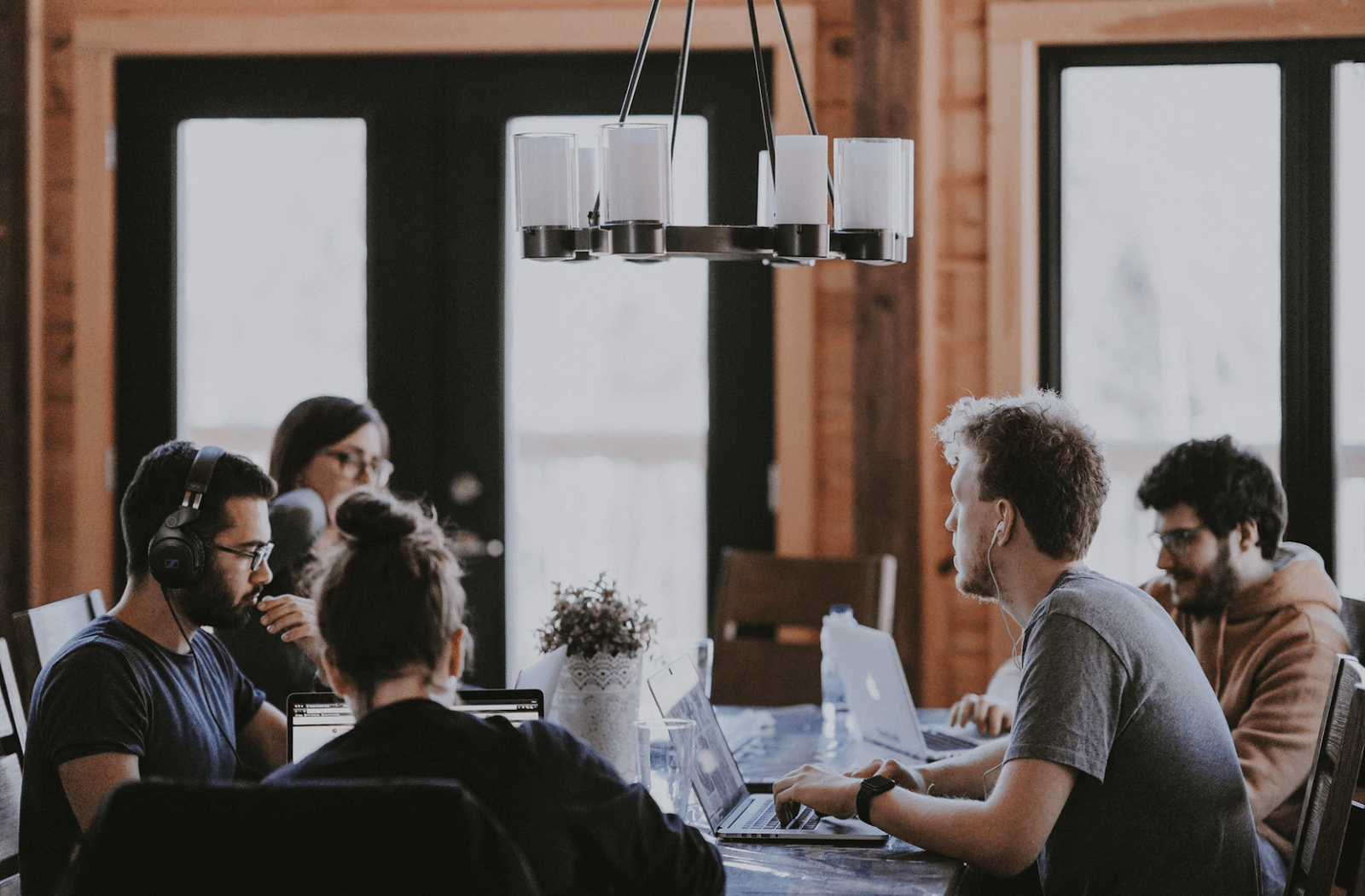 Young business people at a communal table