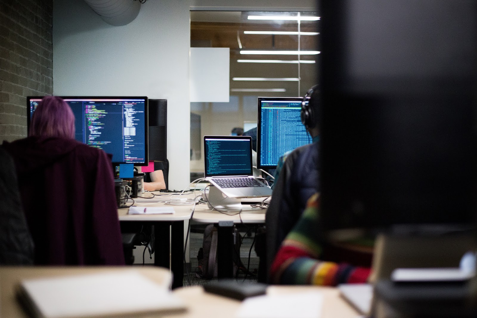 What is a business model: workers at screens in an office