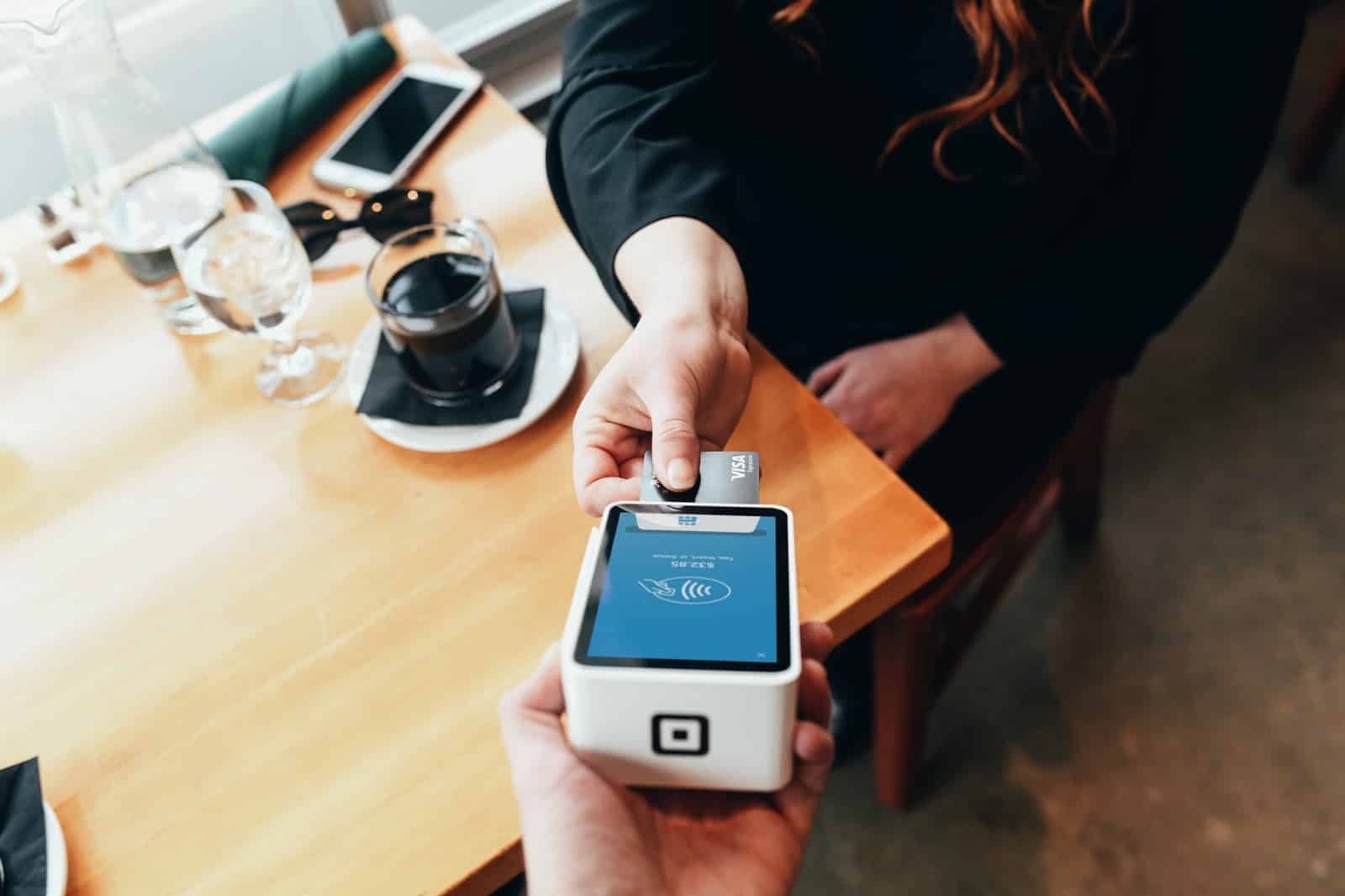 person using credit card