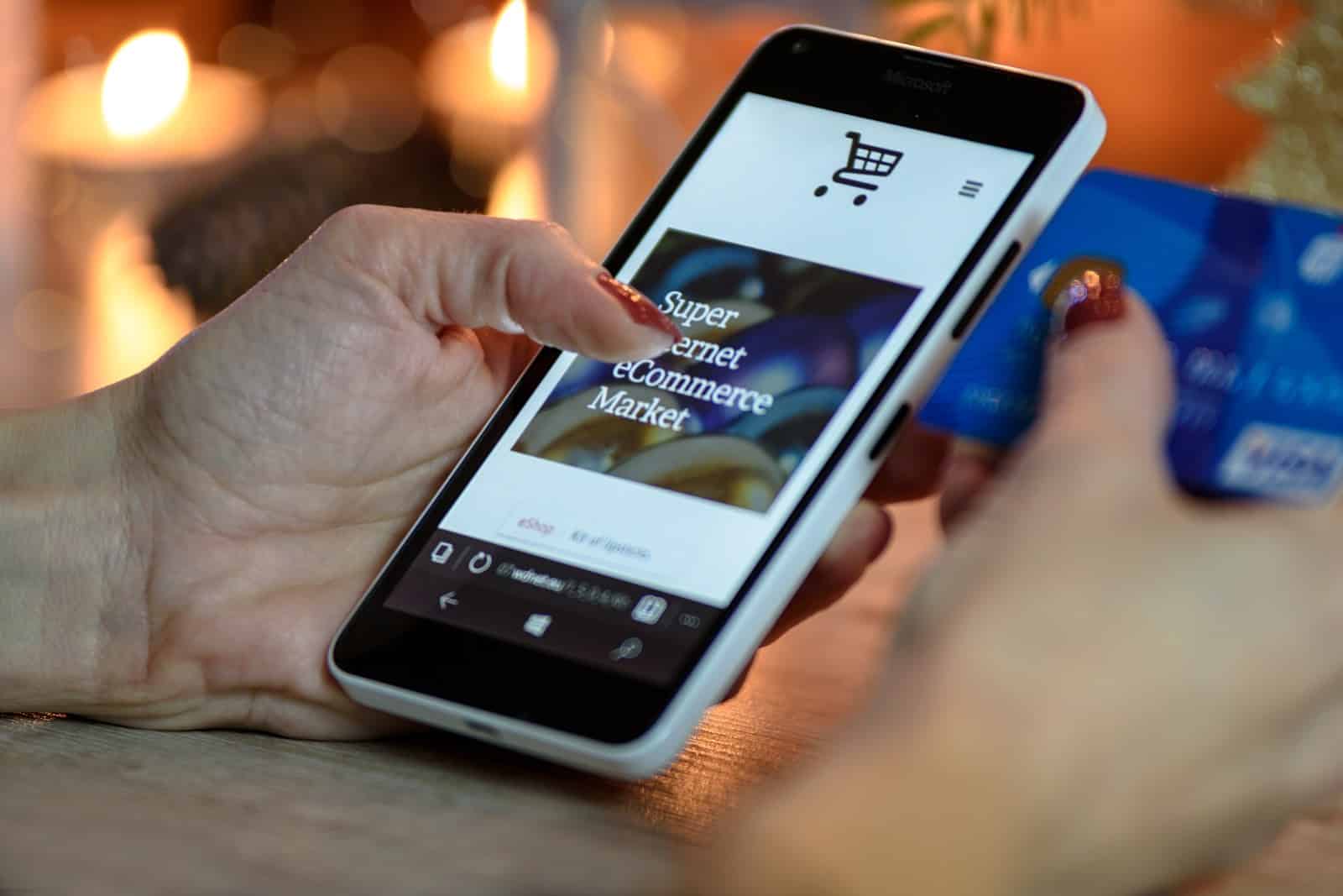 drop app: person shopping on their smartphone