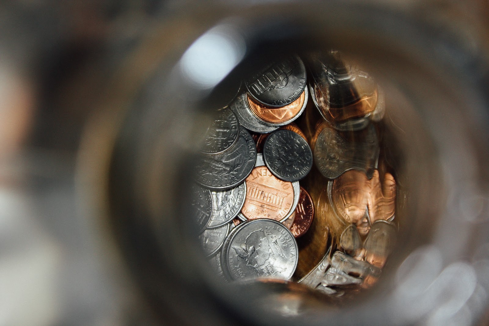 What Is an S Corporation? coins in a jar