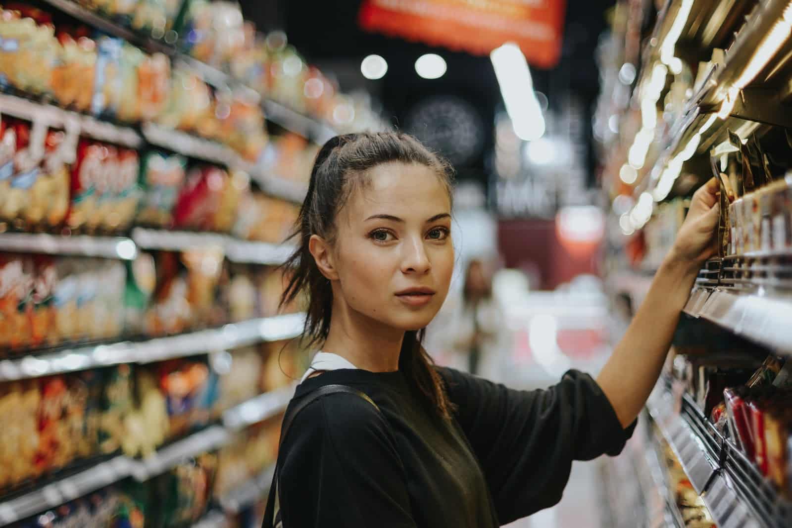 Shopkick: woman shopping at grocery store
