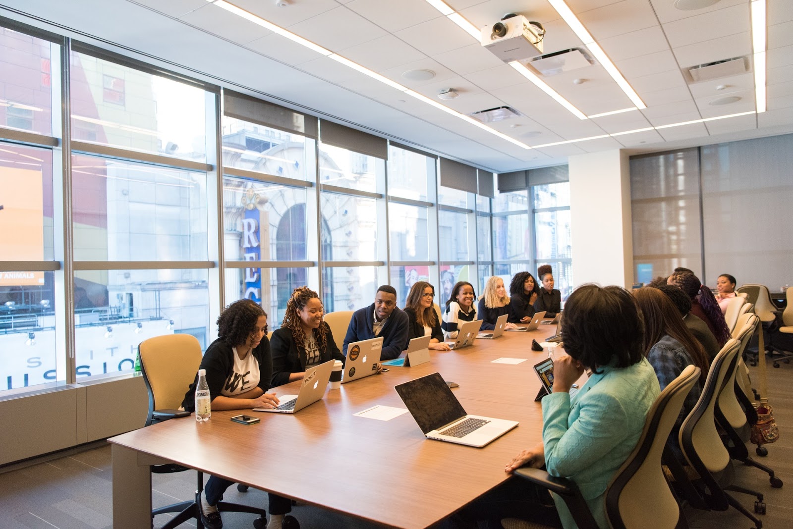 What Is a B Corporation: people meeting at a conference table