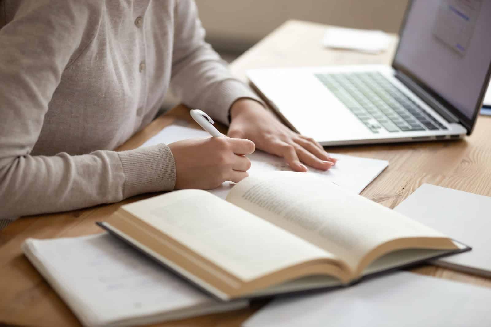 student taking notes