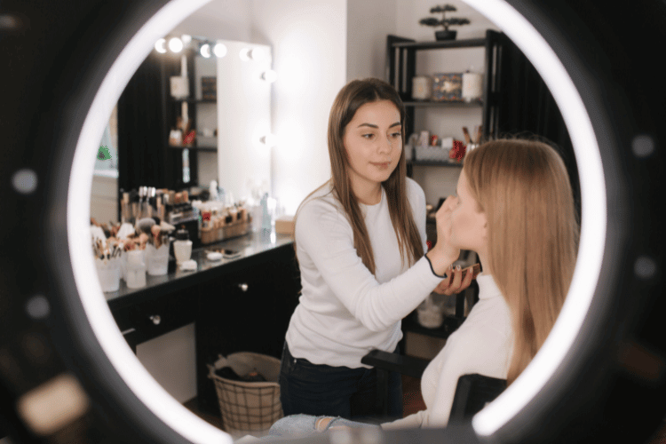 A female makeup artist working in a beauty salon