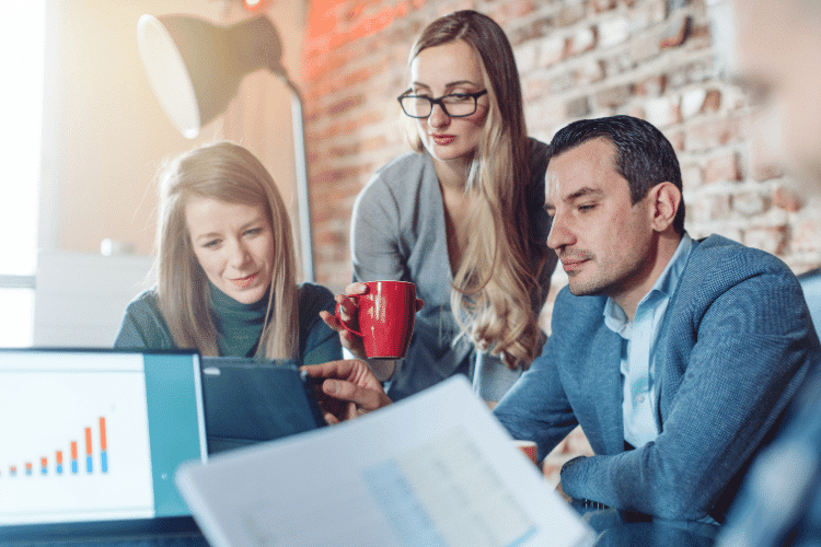 A male accredited investor in a meeting with his team