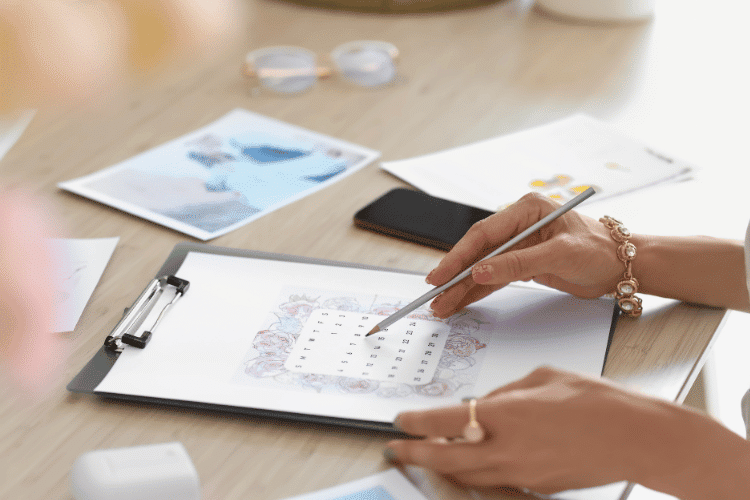 Female Wedding Planner Working in Office, Closeup