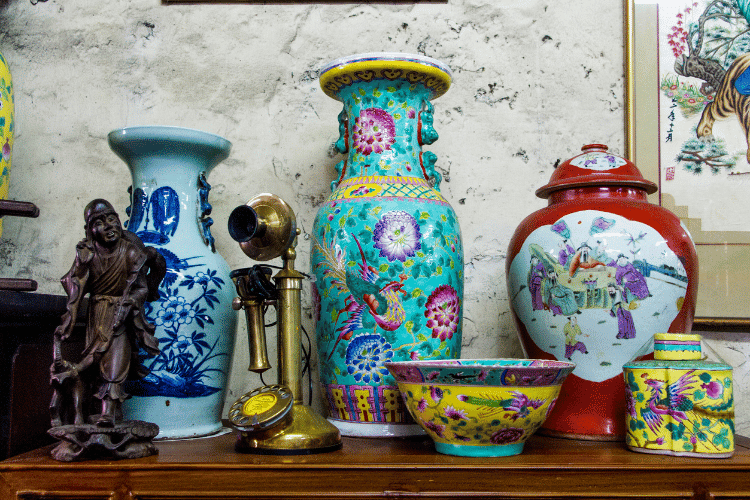 Set of Antiques on a table in an Antiques shop