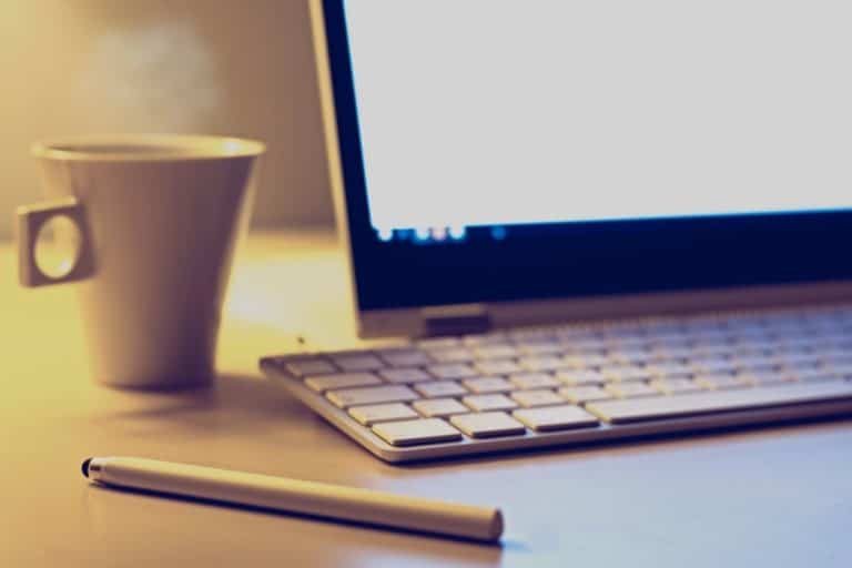 header image for the best computers for working from home post on gigworker.com